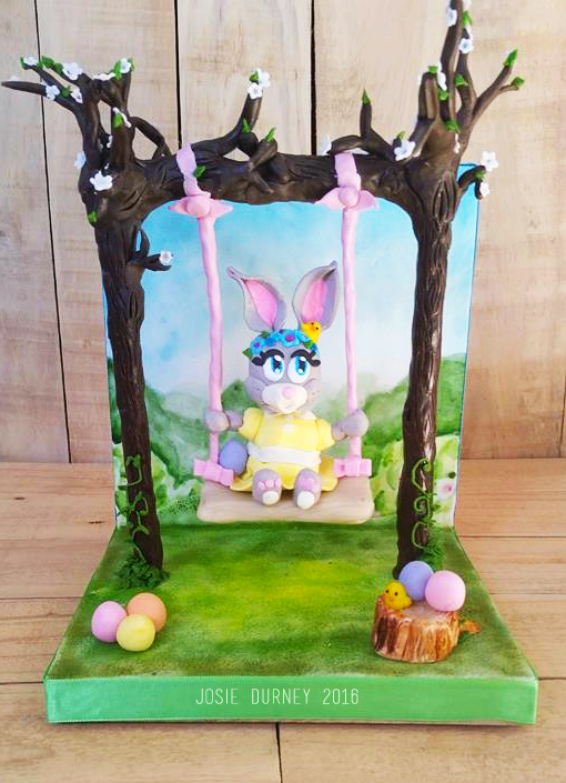 Easter Bunny on a swing by Josie Durney