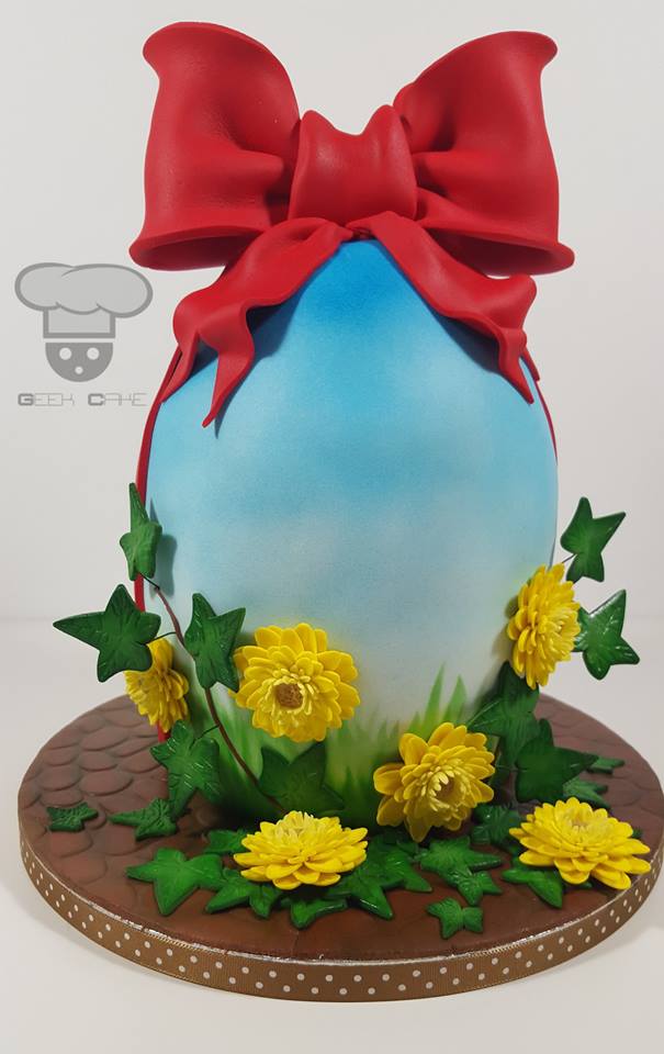 Large Blue Easter Egg with Red Bow and yellow gerberas by Geek  Cake
