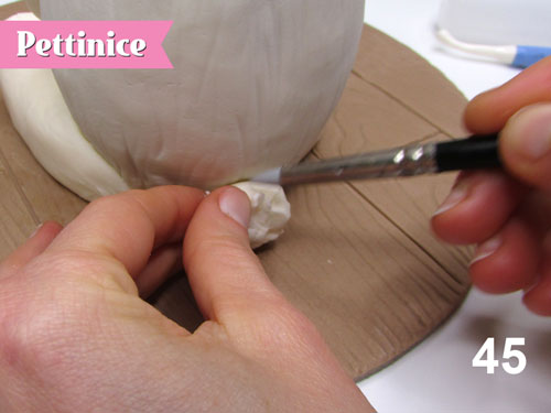 Step 45: Use your clay shapers to create texture.