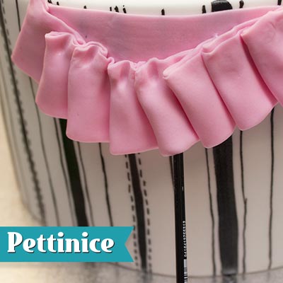 Lift each pleat out using the top of your brush to create movement in the ribbon.