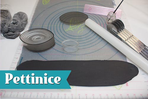 Mix 150g Black Pettinice fondant with 1/2tsp of tylose and roll out thinly.
