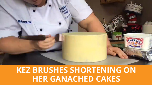Brush your shortening all over your ganached cake.