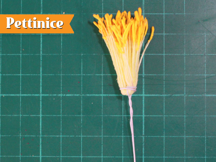 10. Fold the stamens in half to create a bunch, using wire number 24, tie together as a bunch