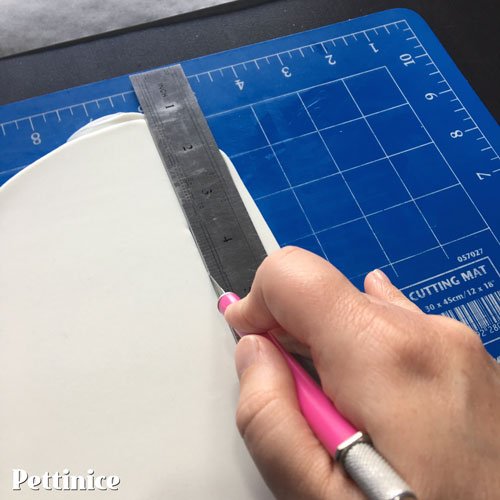 Use a ruler  to cut straight edges.