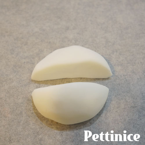 Roll another ball of fondant and cut in half.