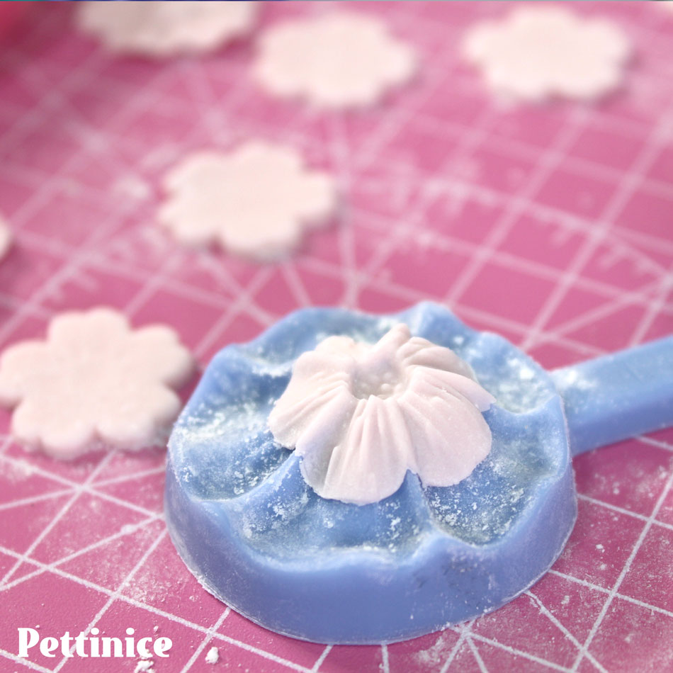 As a quick option, you can use a veined press to add texture to your petals.