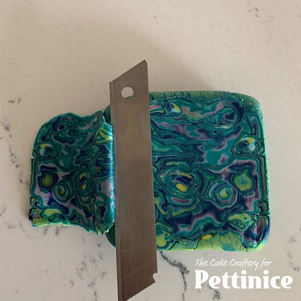 As you slice, you will see wonderful patterns in the fondant.