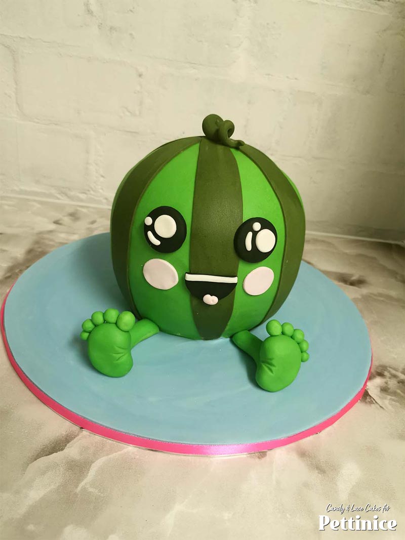 Attach the little feet and the happiest looking Kawaii Watermelon cake is done!