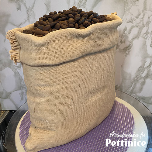 Now you are finished! Pile your premade coffee beans into the top of the sack.
